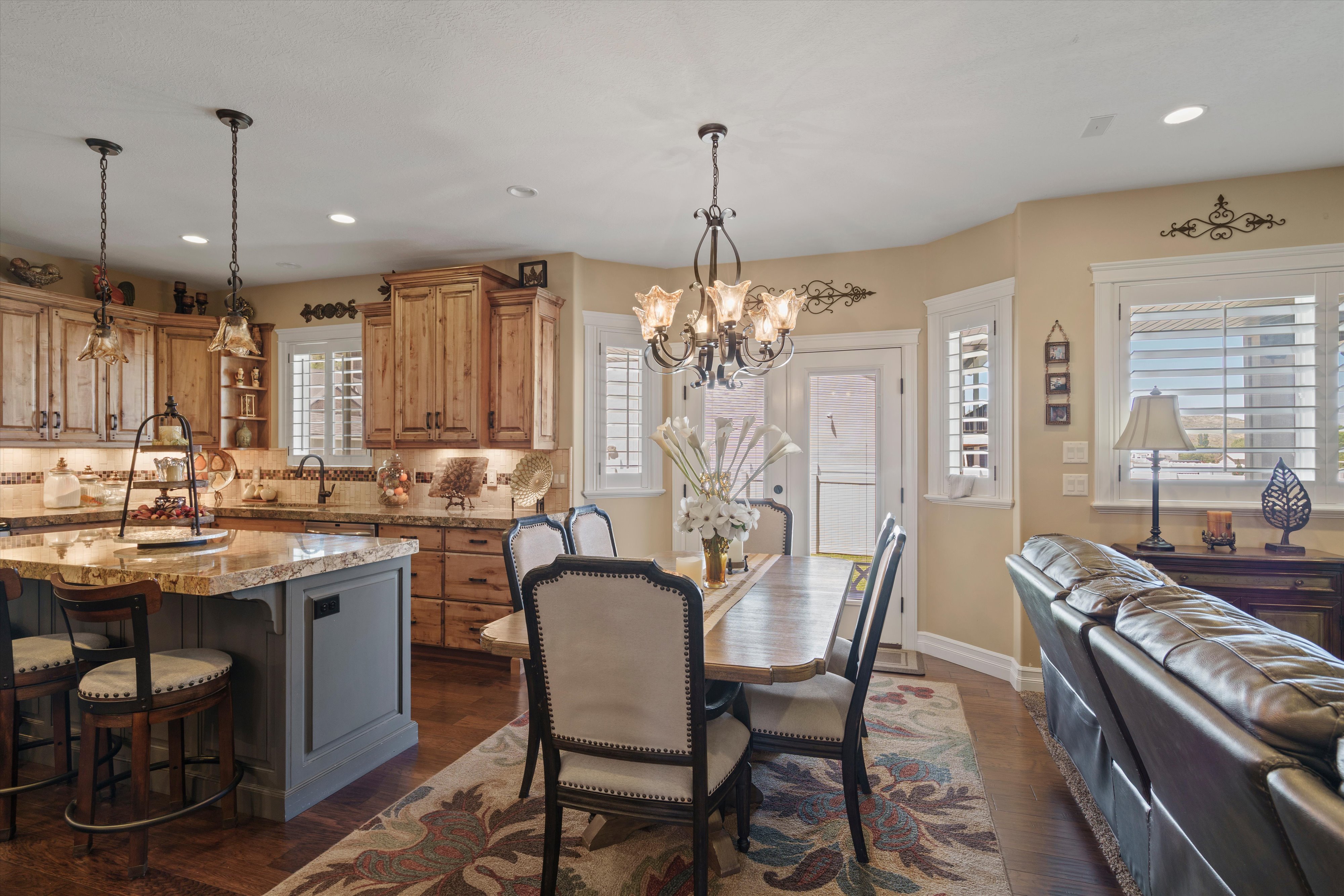 Open-concept living space featuring wood-finish flooring