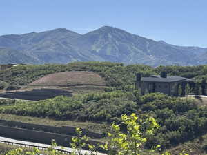 Contemporary architectural style residence set into a hillside with multiple retaining walls