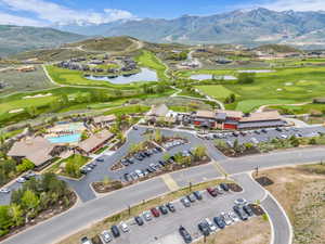 Expansive golf course community featuring multiple fairways, greens, and water features