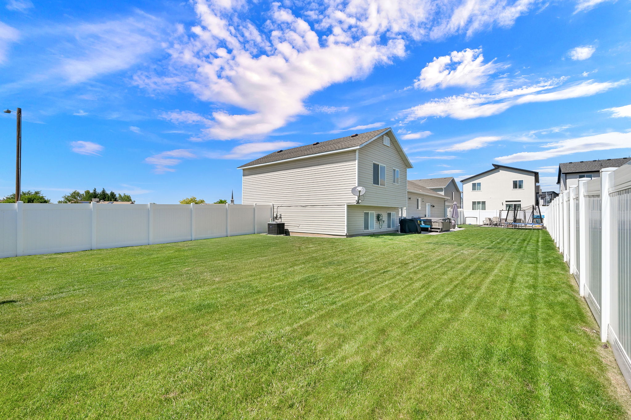 Expansive green lawn providing ample outdoor space