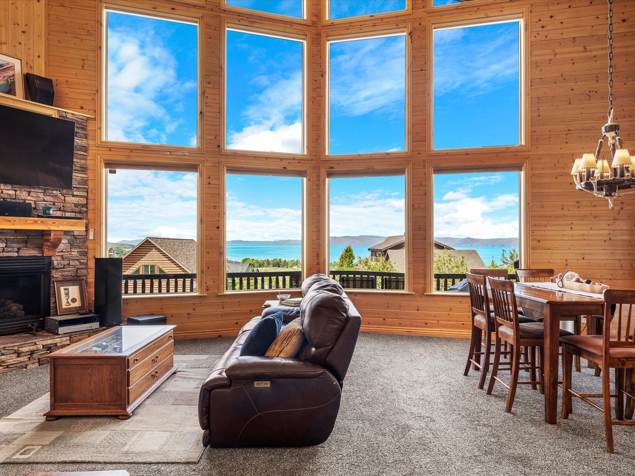 Expansive window wall showcasing distant water scenery
