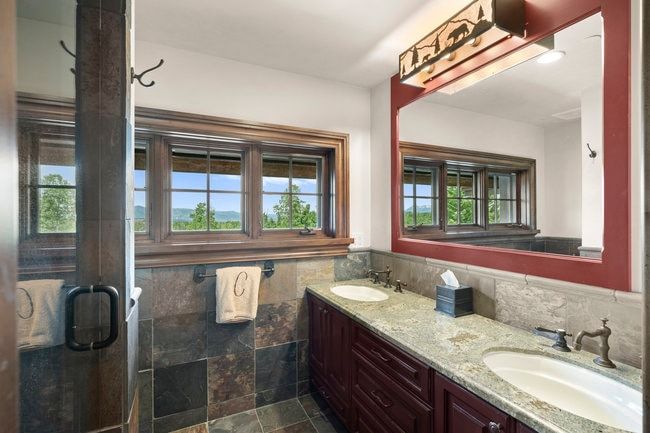 Double vanity with granite countertop and dual undermount sinks