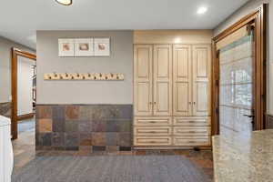 Built-in cabinetry with ample storage