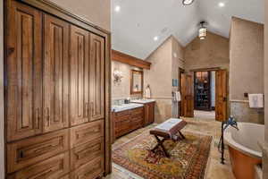 Integrated wood-finish cabinetry providing extensive storage
