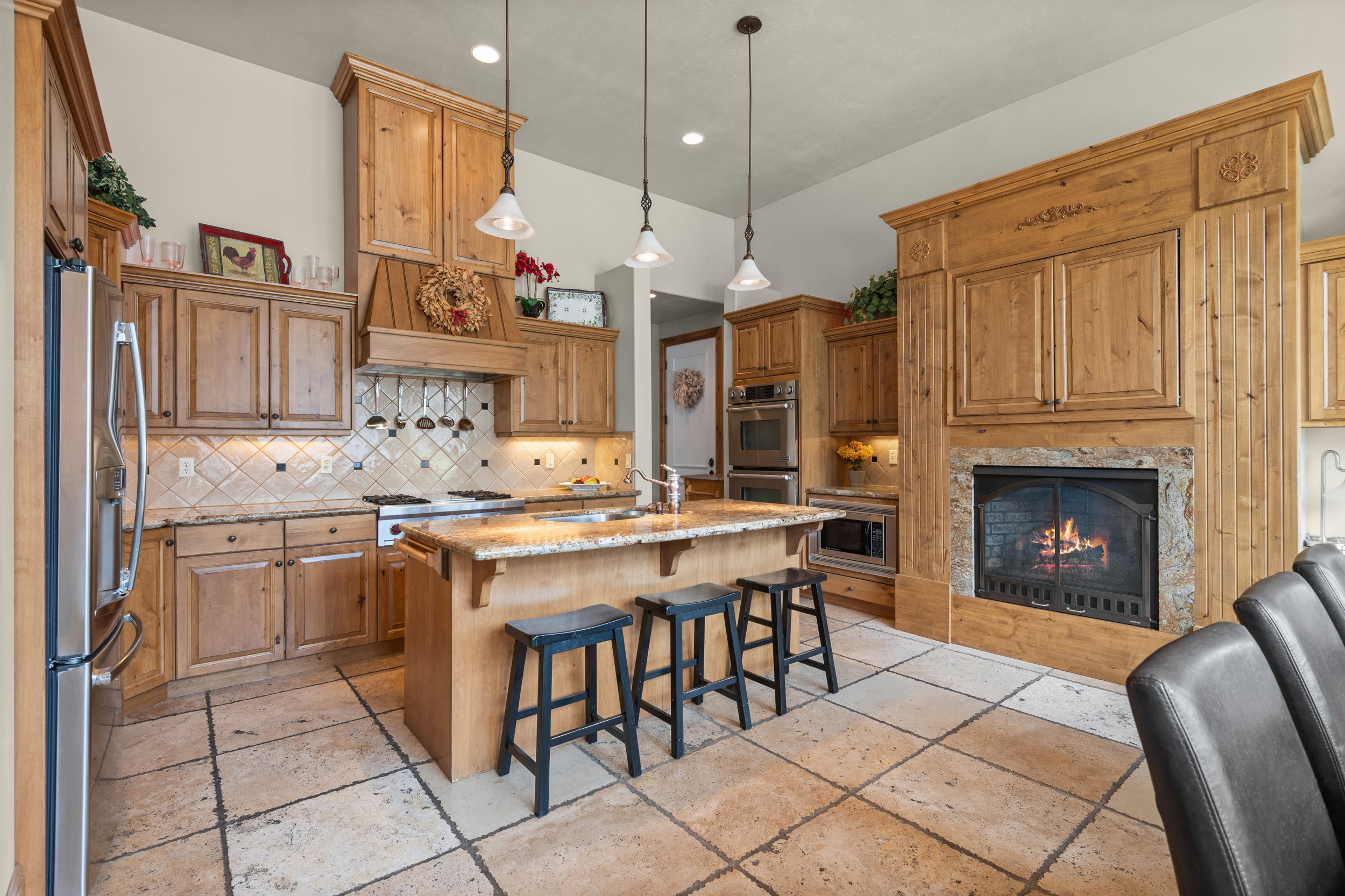 Kitchen – White Door Leads to 2-Car Garage