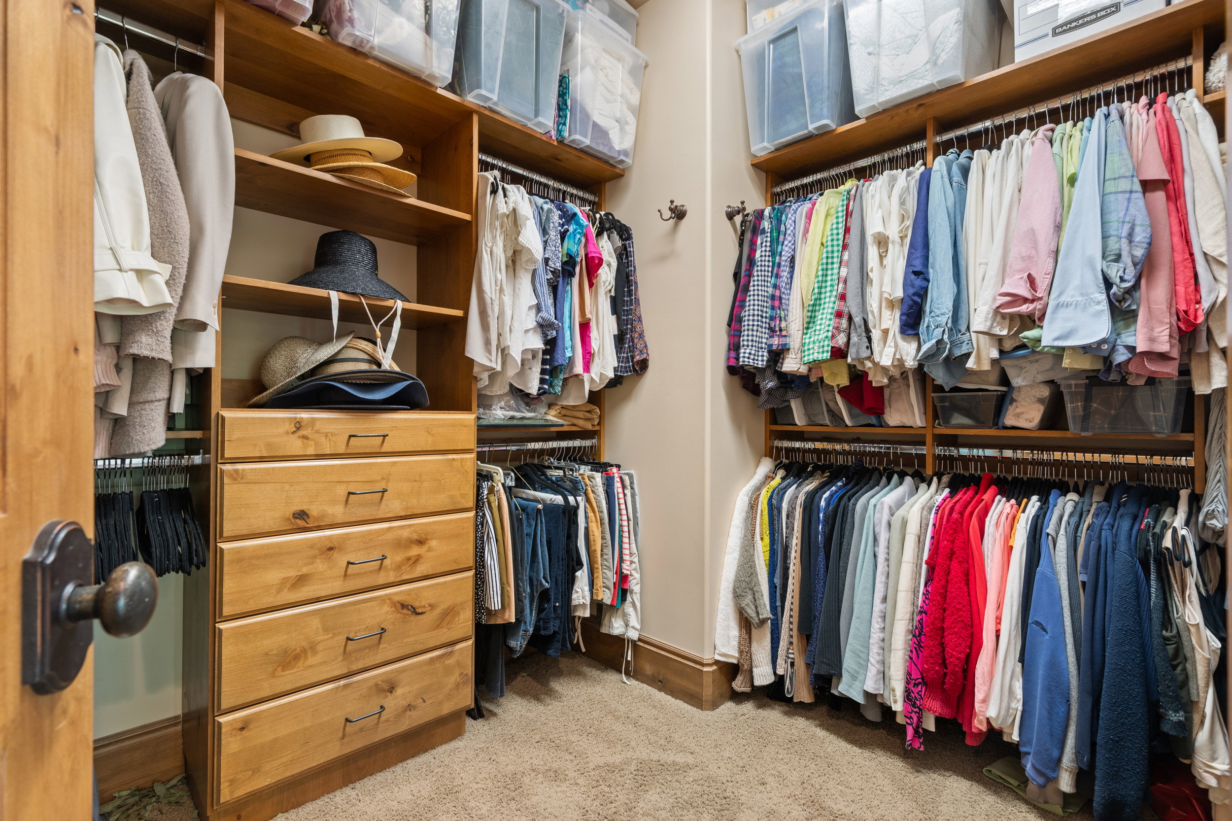 One of two Primary Bedroom Closets with Built-ins
