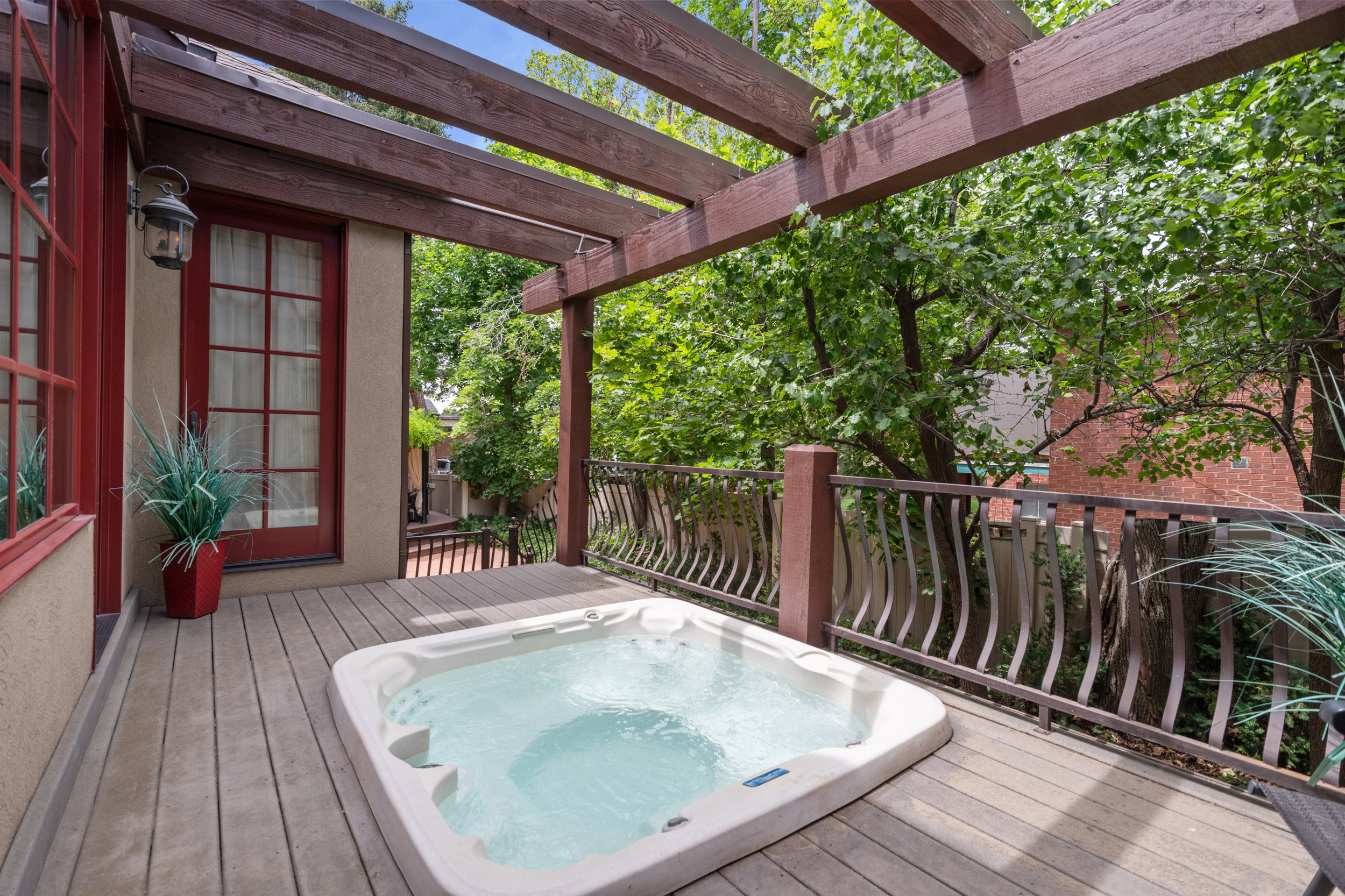 Back Deck with Hot Tub & Pergola – Door Leads to Primary Bedroom