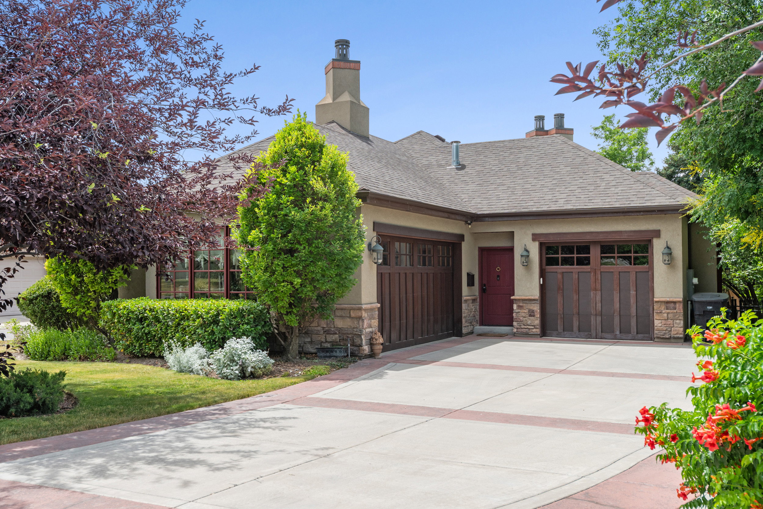 Close-up of 3-Car Garage and Side Entrance