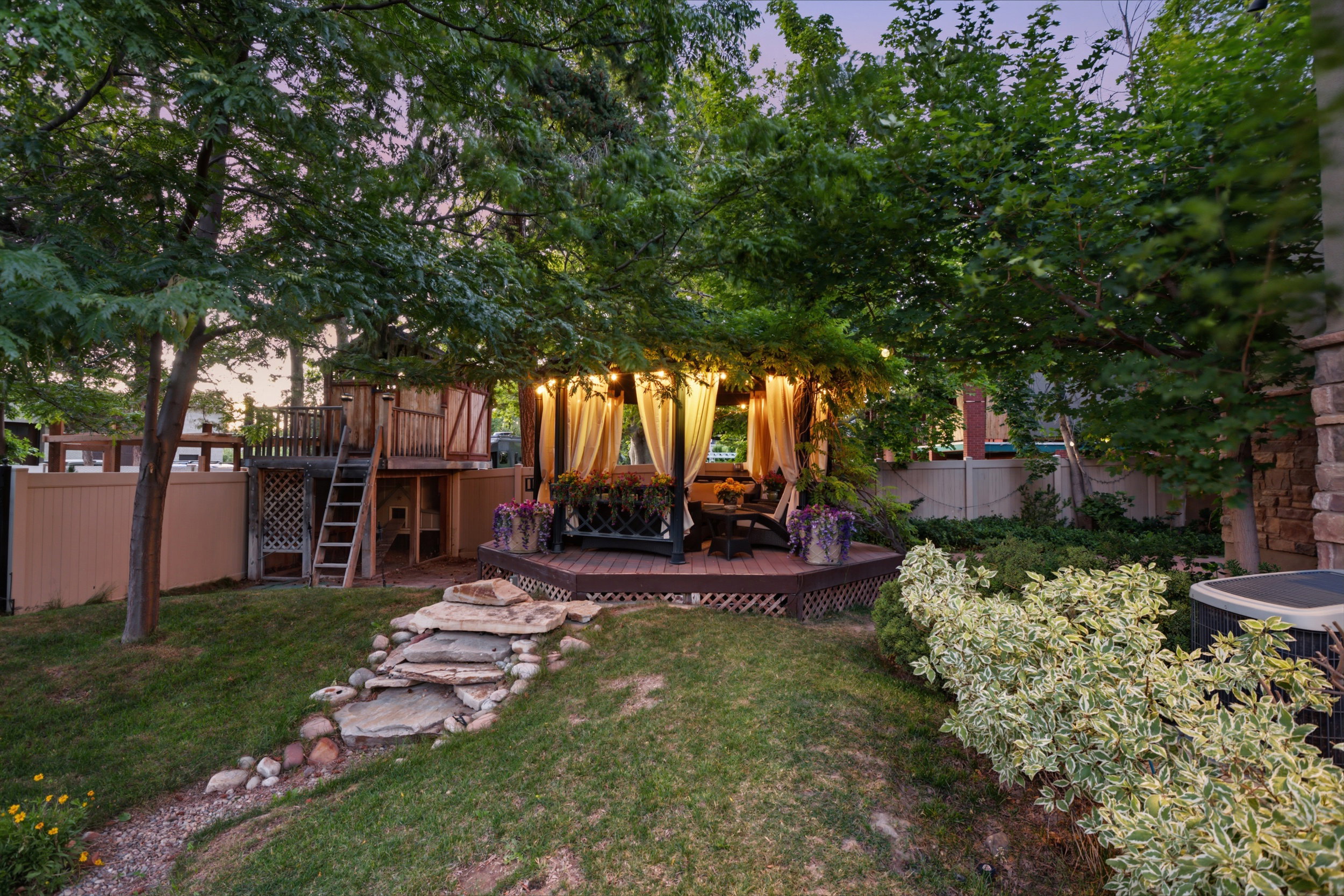 Gazebo at Twilight with Chicken Coop and Playhouse Above