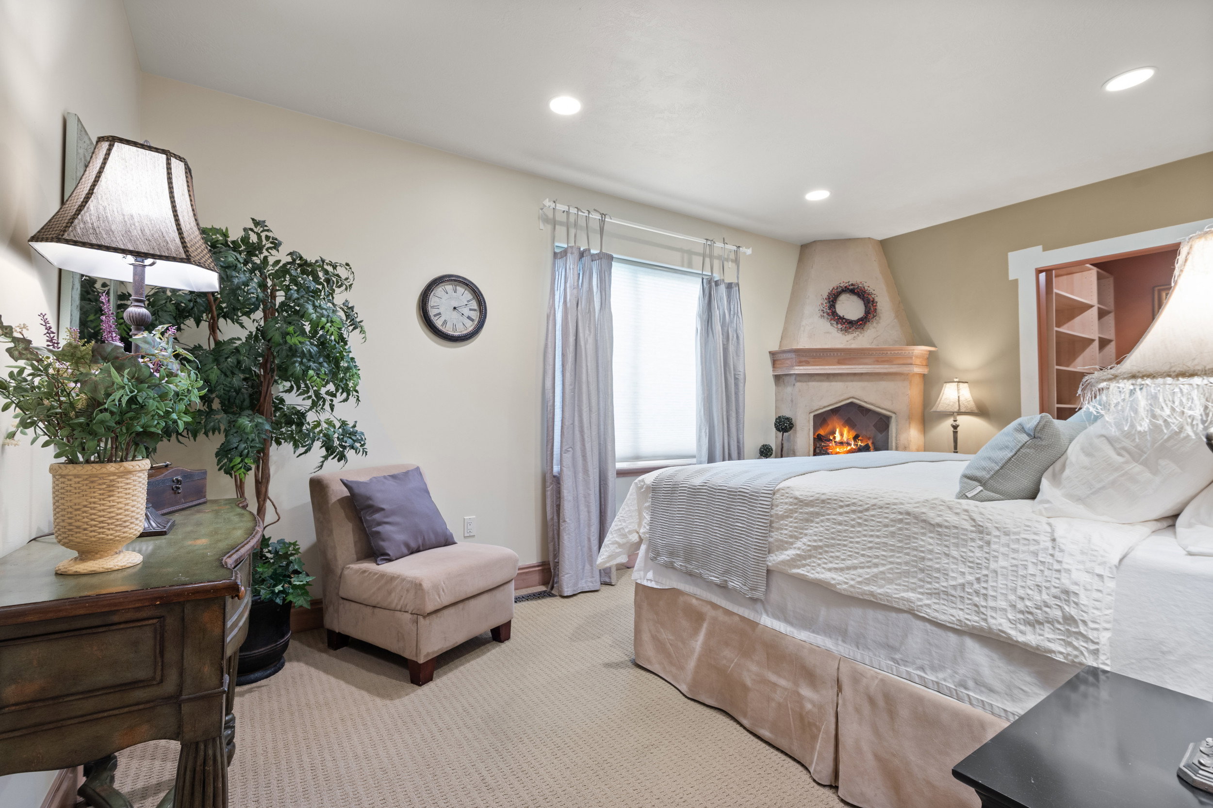 Downstairs Primary with Faux Fireplace