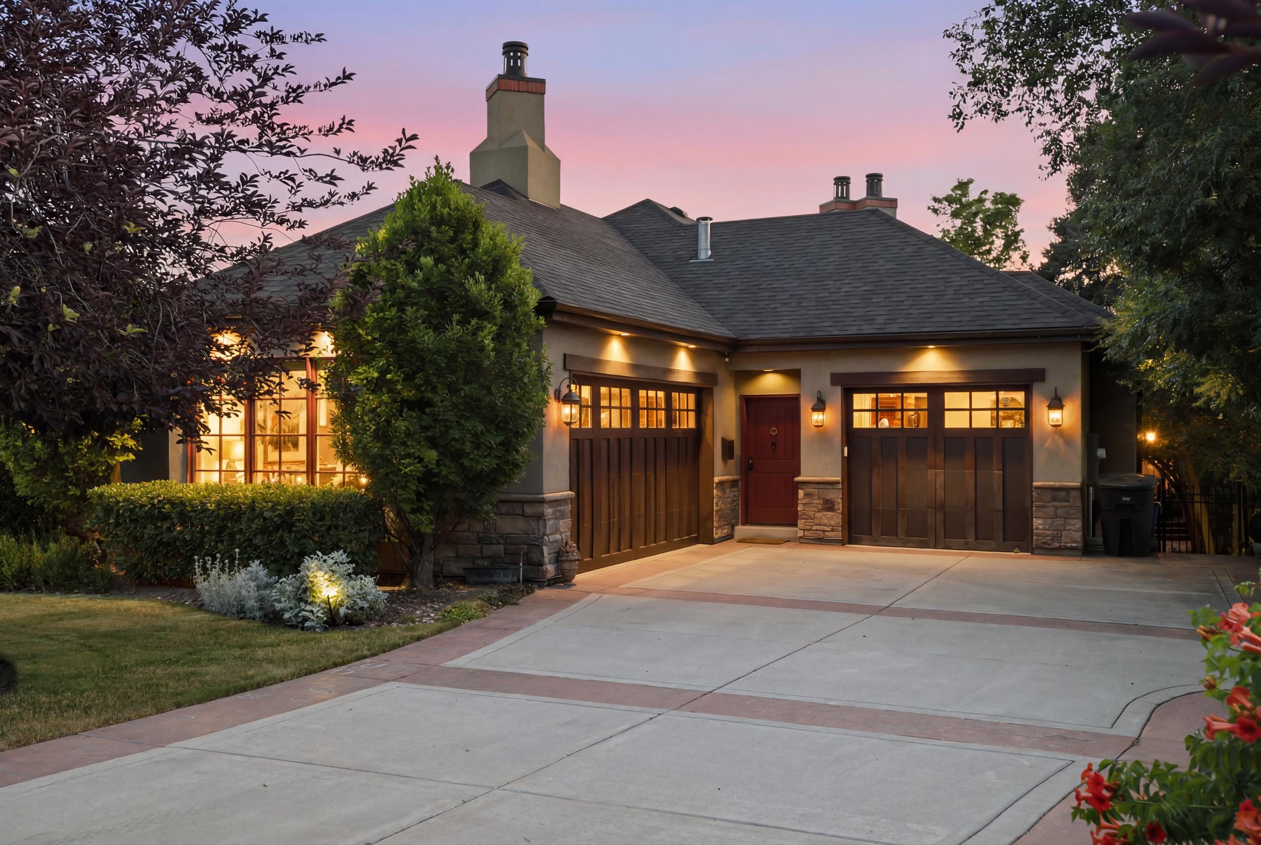 Close-up Garage View – Gate Leading to Back Yard to the Right - Twilight