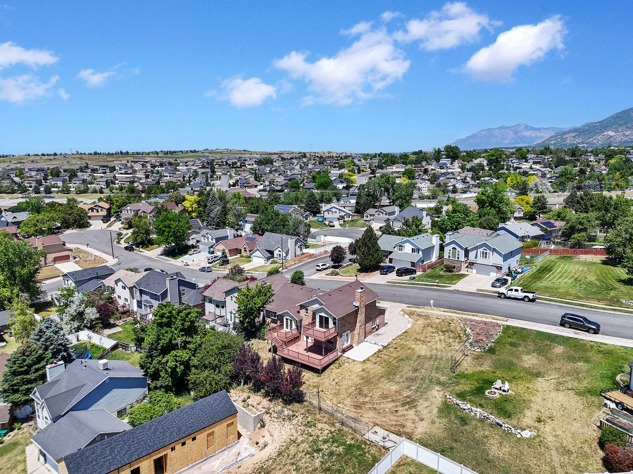 Sprawling residential area featuring a distinct mountain backdrop