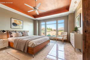 Tray ceiling with a textured orange finish and ceiling fan