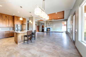 Open concept living space featuring large format tile flooring throughout