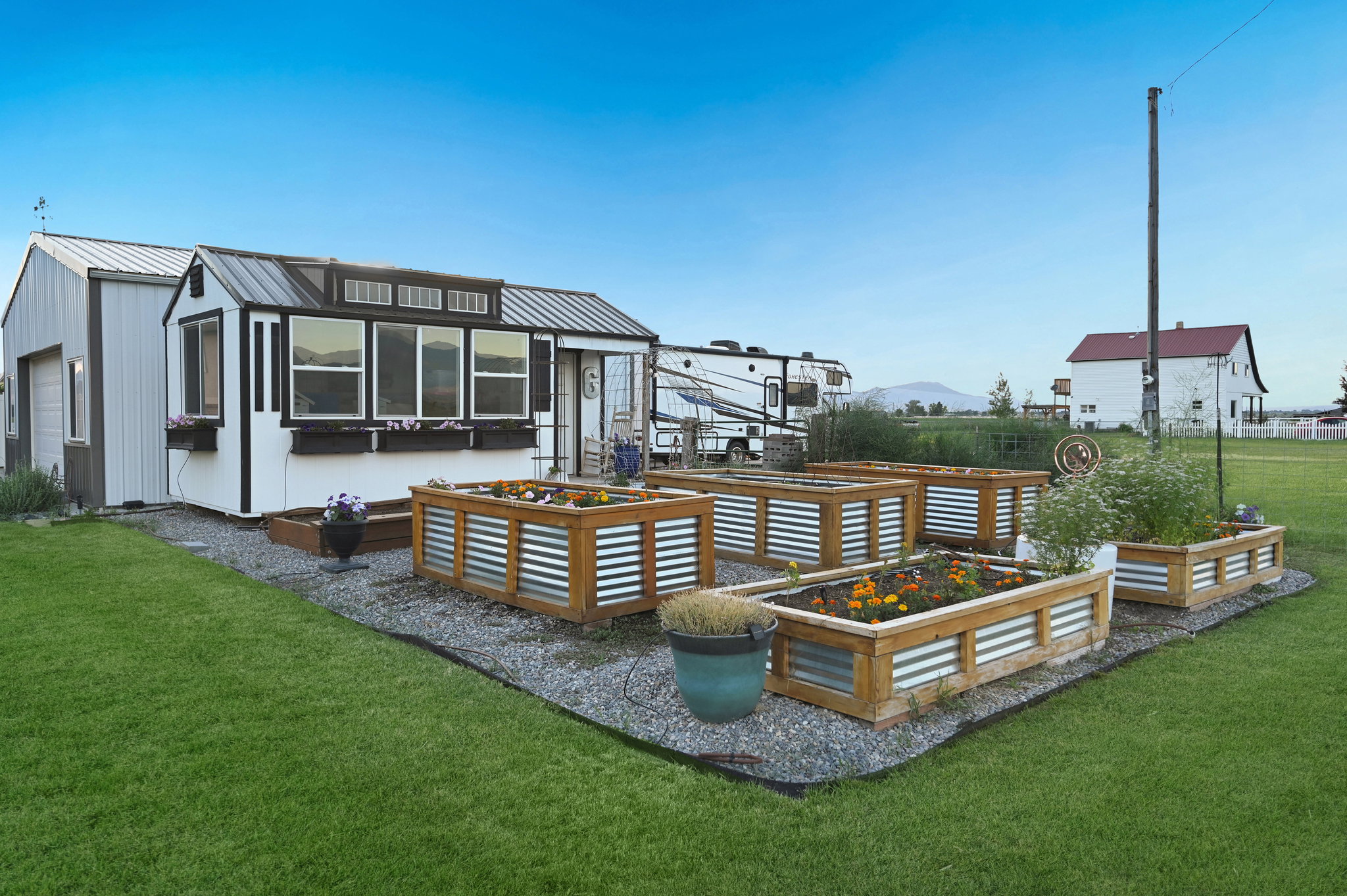 Garden shed with raised garden beds.