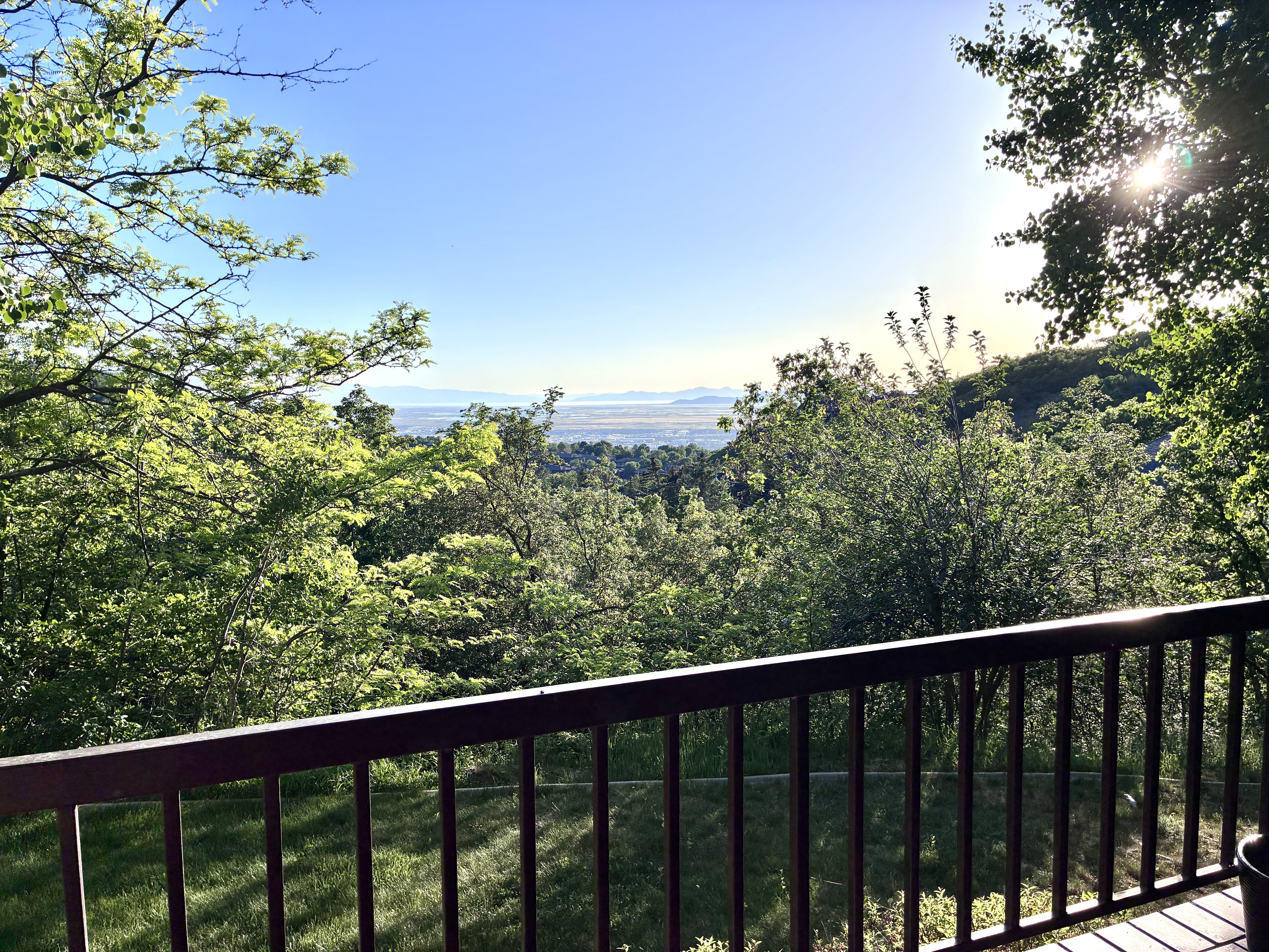 Expansive mountain and valley scenery from a private outdoor space