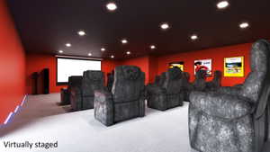 VIRTUAL depiction of an unfinished Dedicated home theater featuring a large projection screen, recessed lighting, and integrated wall speakers