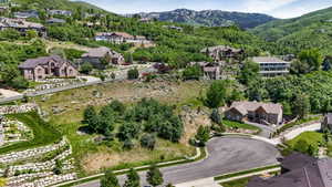Hillside residential setting featuring paved streets and established homes