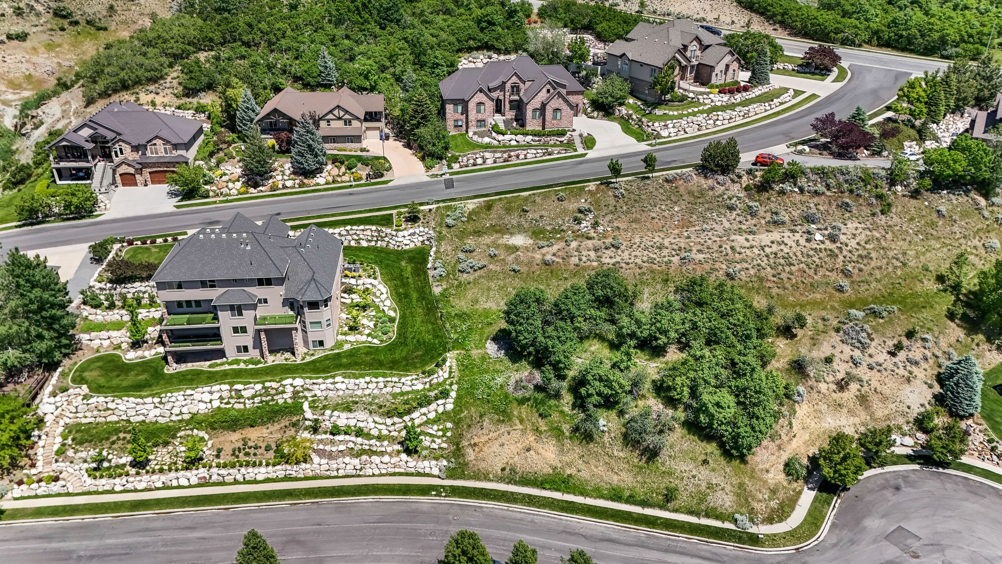 Terraced landscaping with stone retaining walls