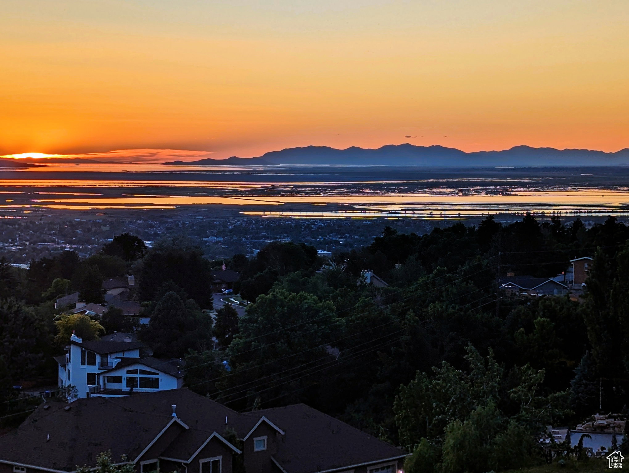 Expansive territorial scenery featuring distant mountains and bodies of water