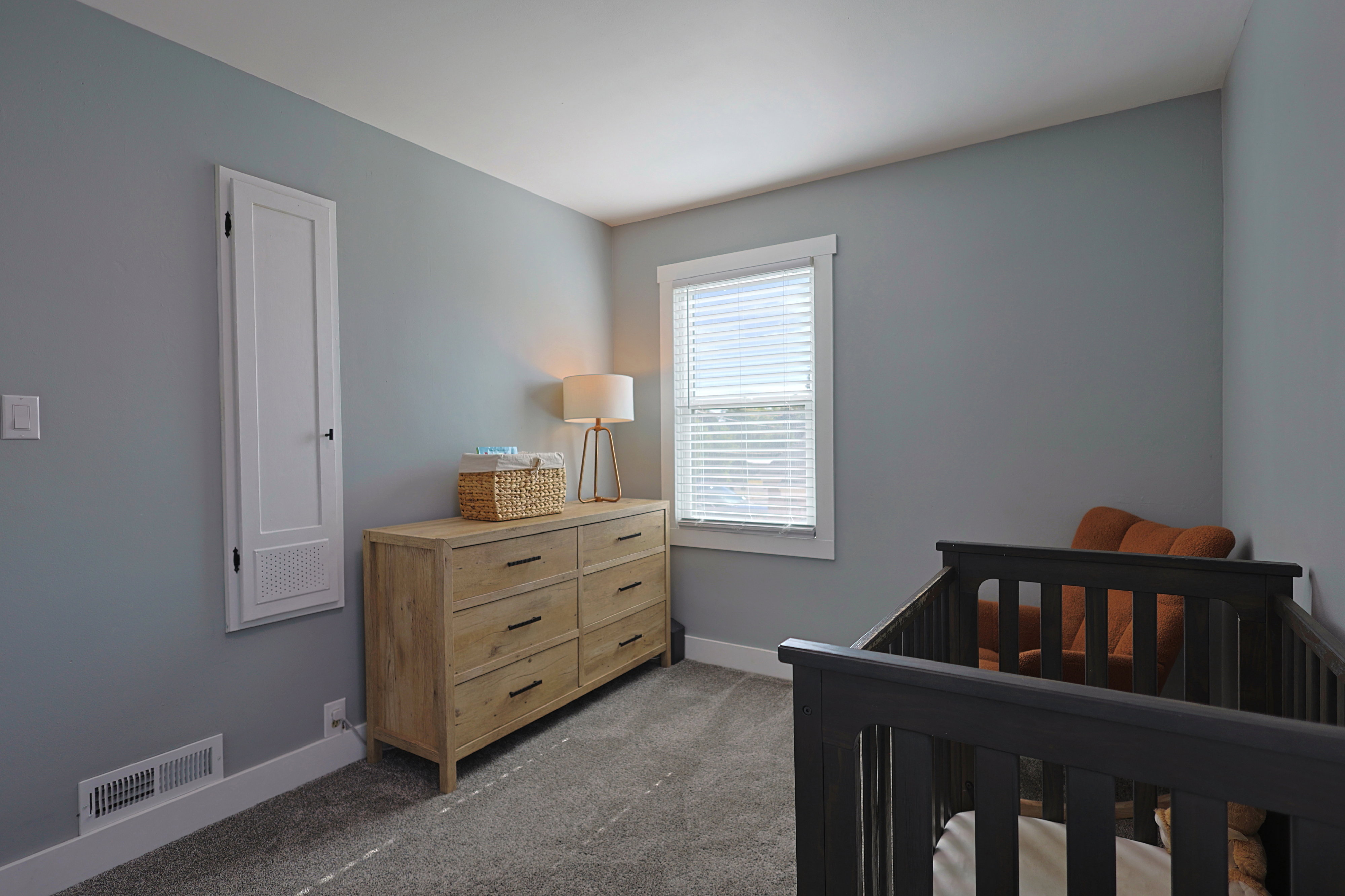 Bed room featuring a neutral gray carpet