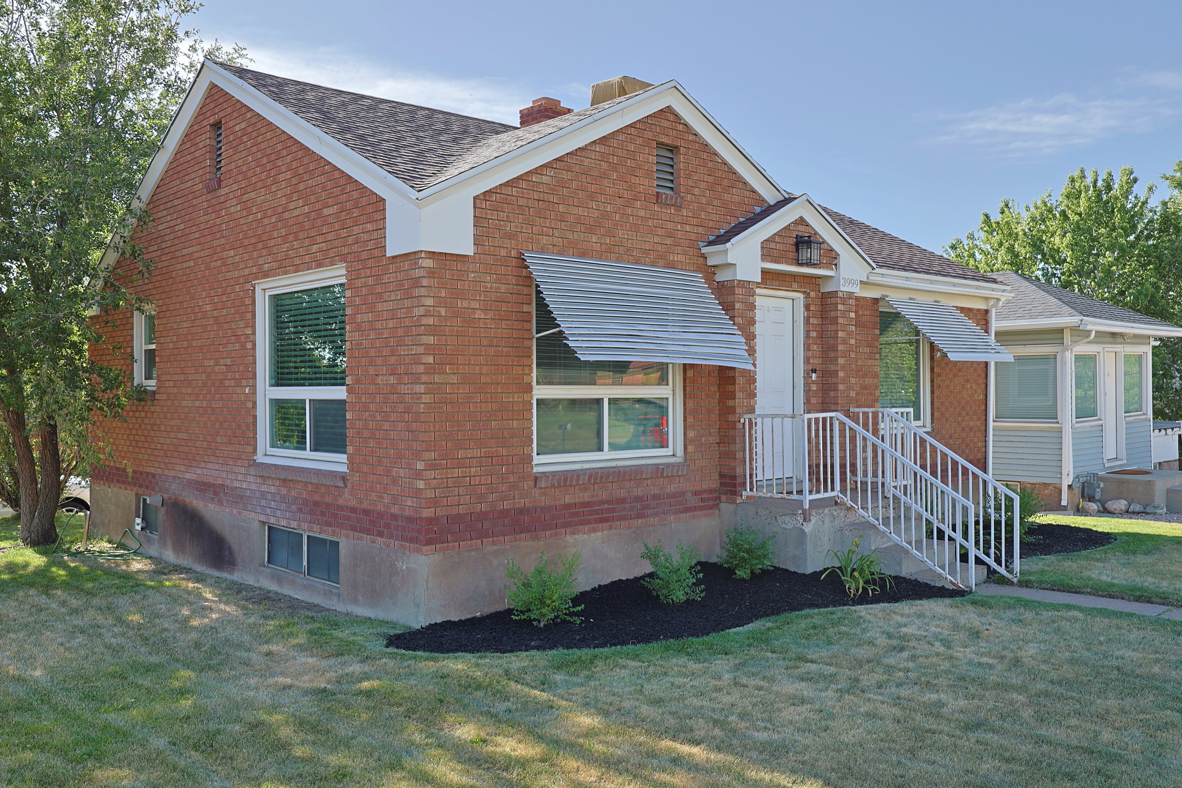 Brick exterior with white trim details