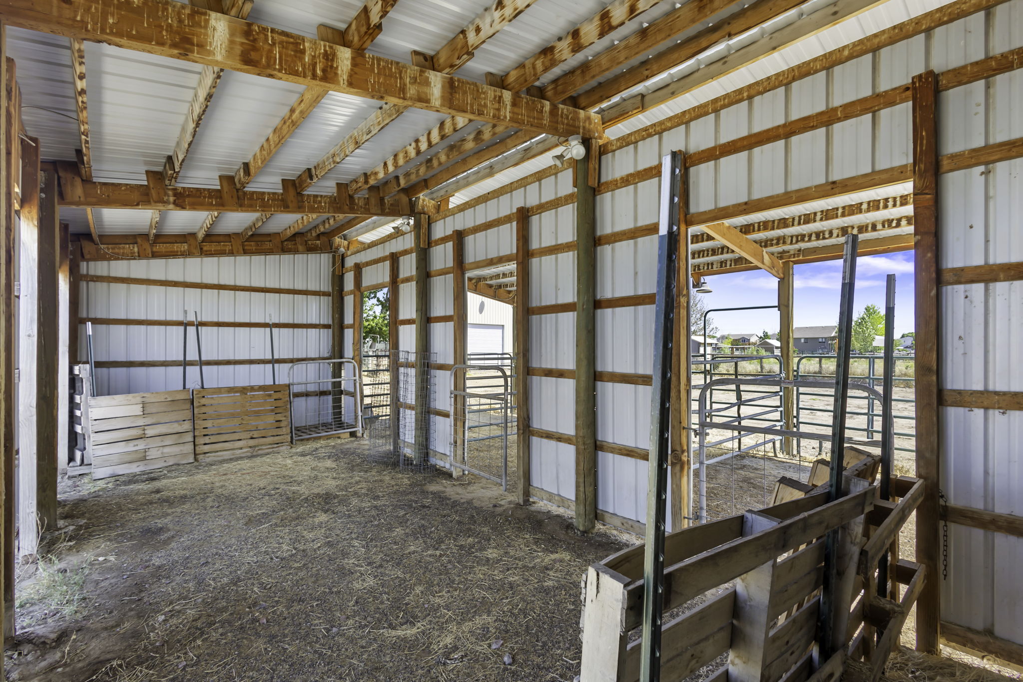 Spacious horse shelter equipped and 3 horse stalls and electricity