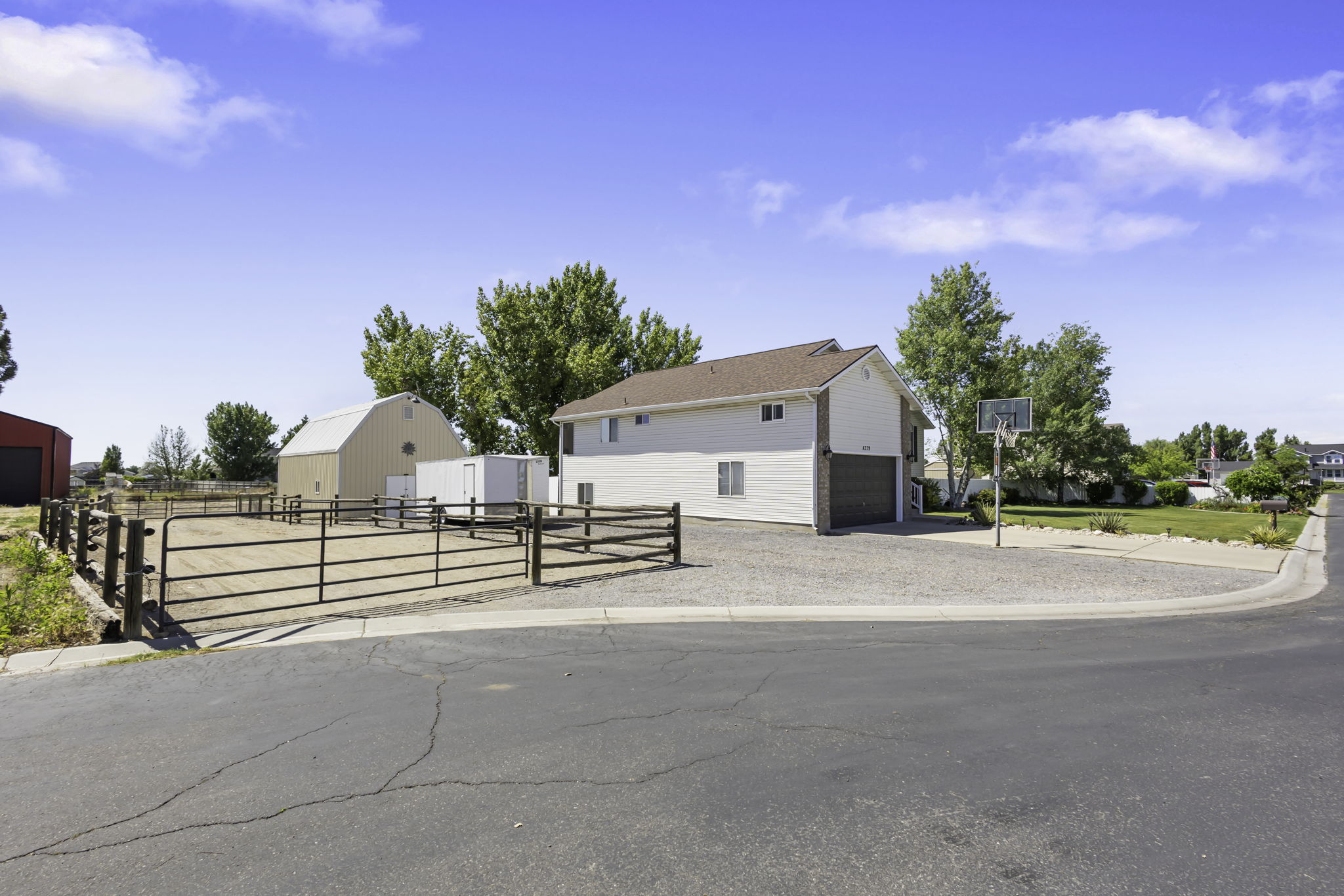 View of the home and a horse paddock.
