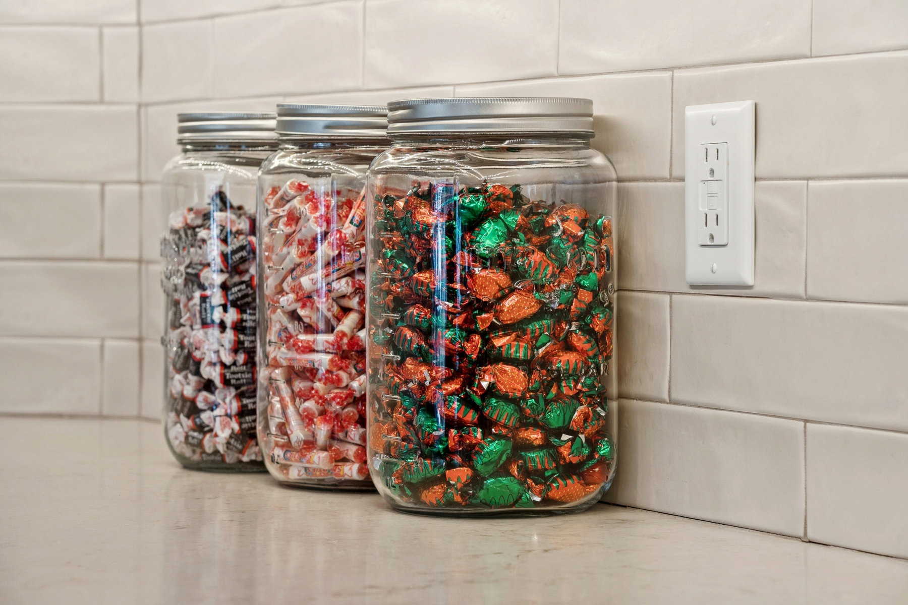 Light-colored subway tile backsplash complementing a neutral countertop