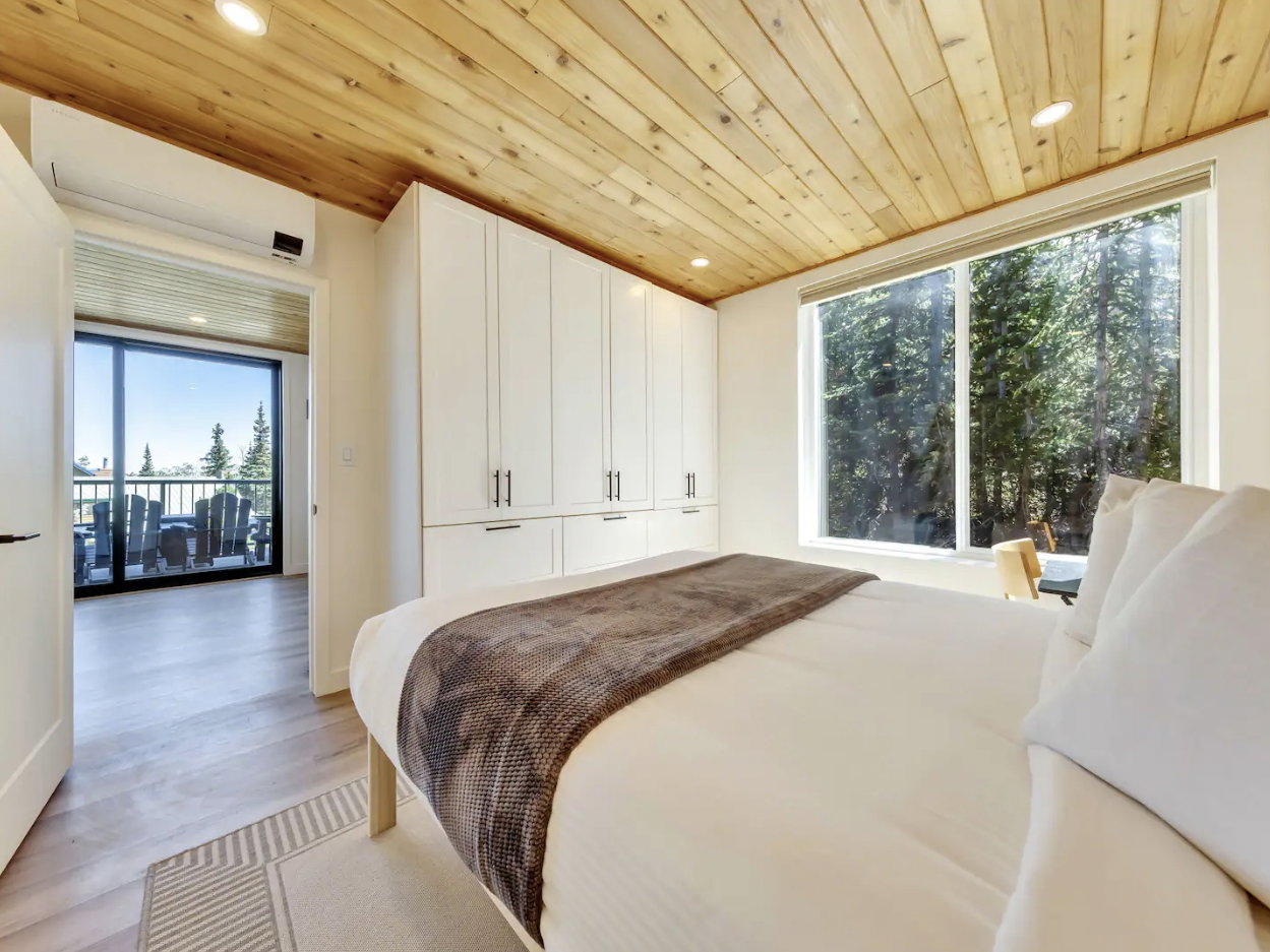 Wood-paneled ceiling with recessed lighting