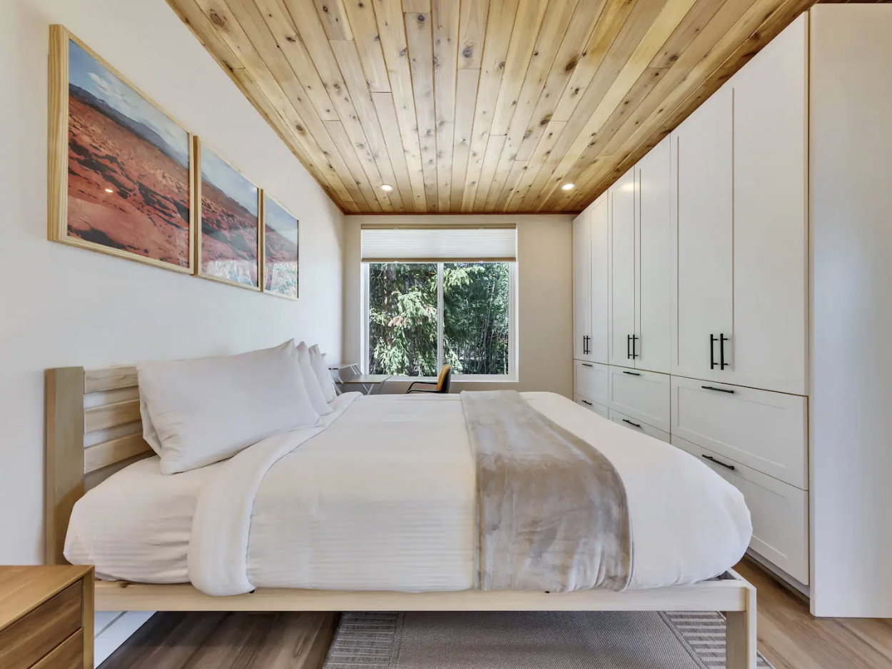 Wood-paneled ceiling with recessed lighting