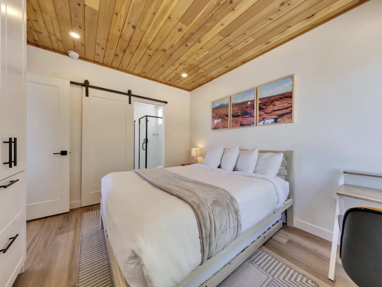 Wood-finish plank ceiling with recessed lighting