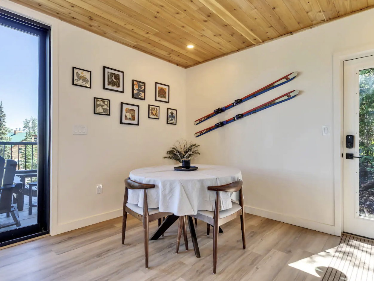 Wood-finish flooring complementing a natural wood plank ceiling