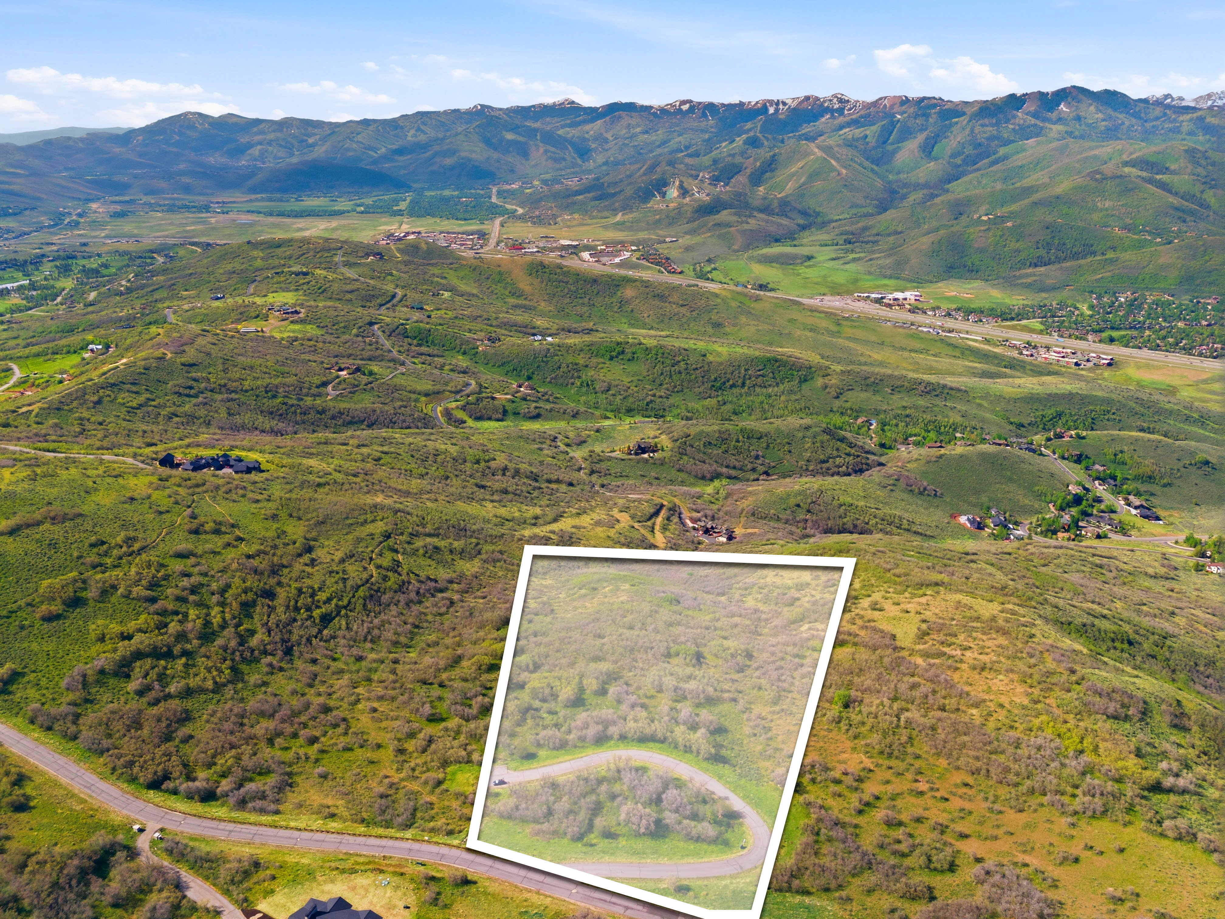 Expansive parcel featuring a natural, verdant landscape with varied topography