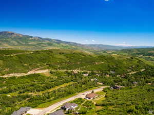 Expansive mountain scenery with verdant hillsides