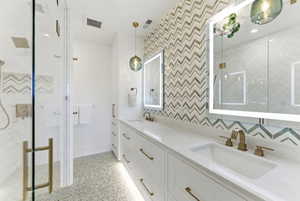 Dual vanity with integrated sinks and a broad countertop