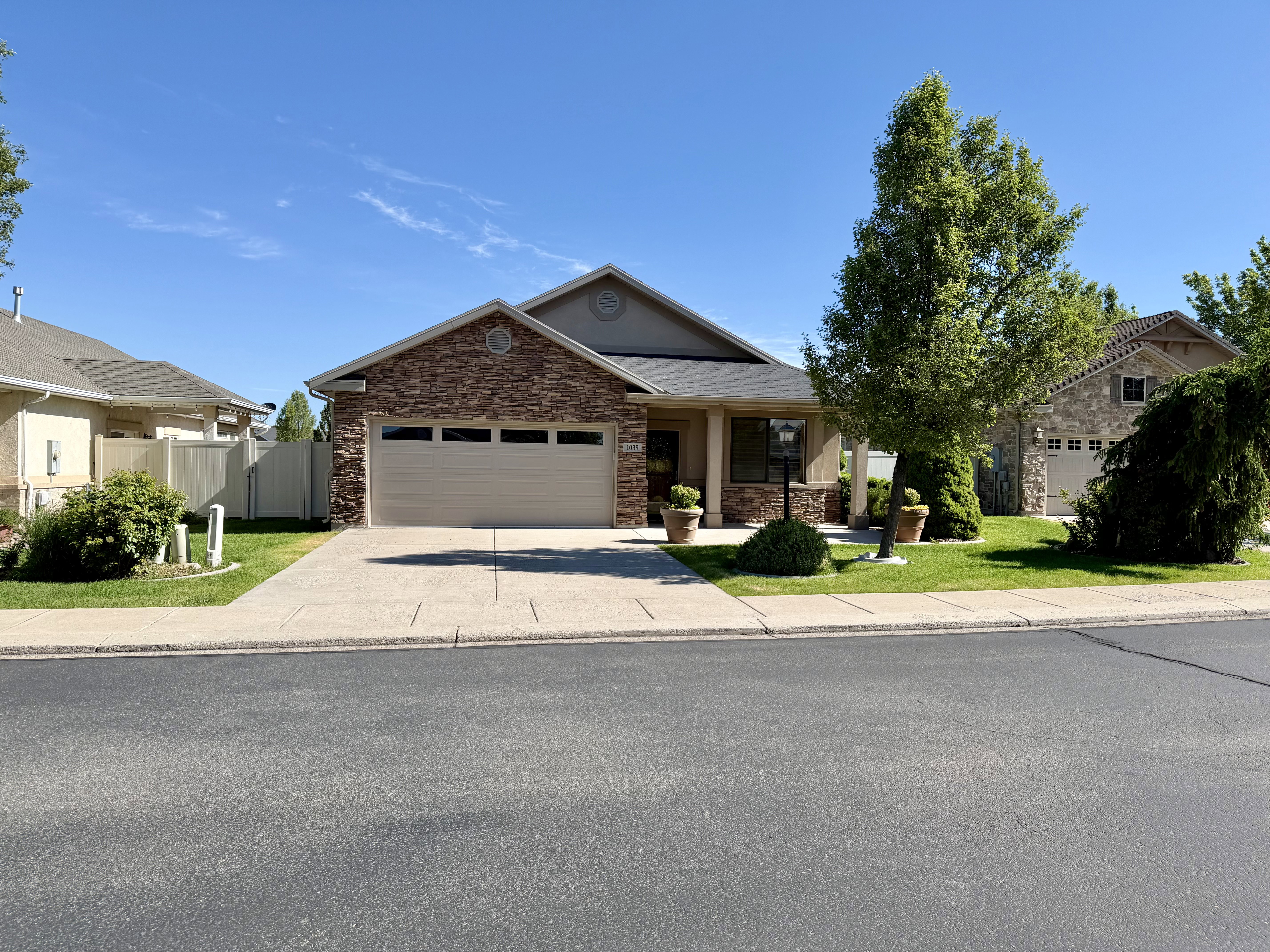 Beautifully maintained rambler with timeless curb appeal and a warm, welcoming presence.