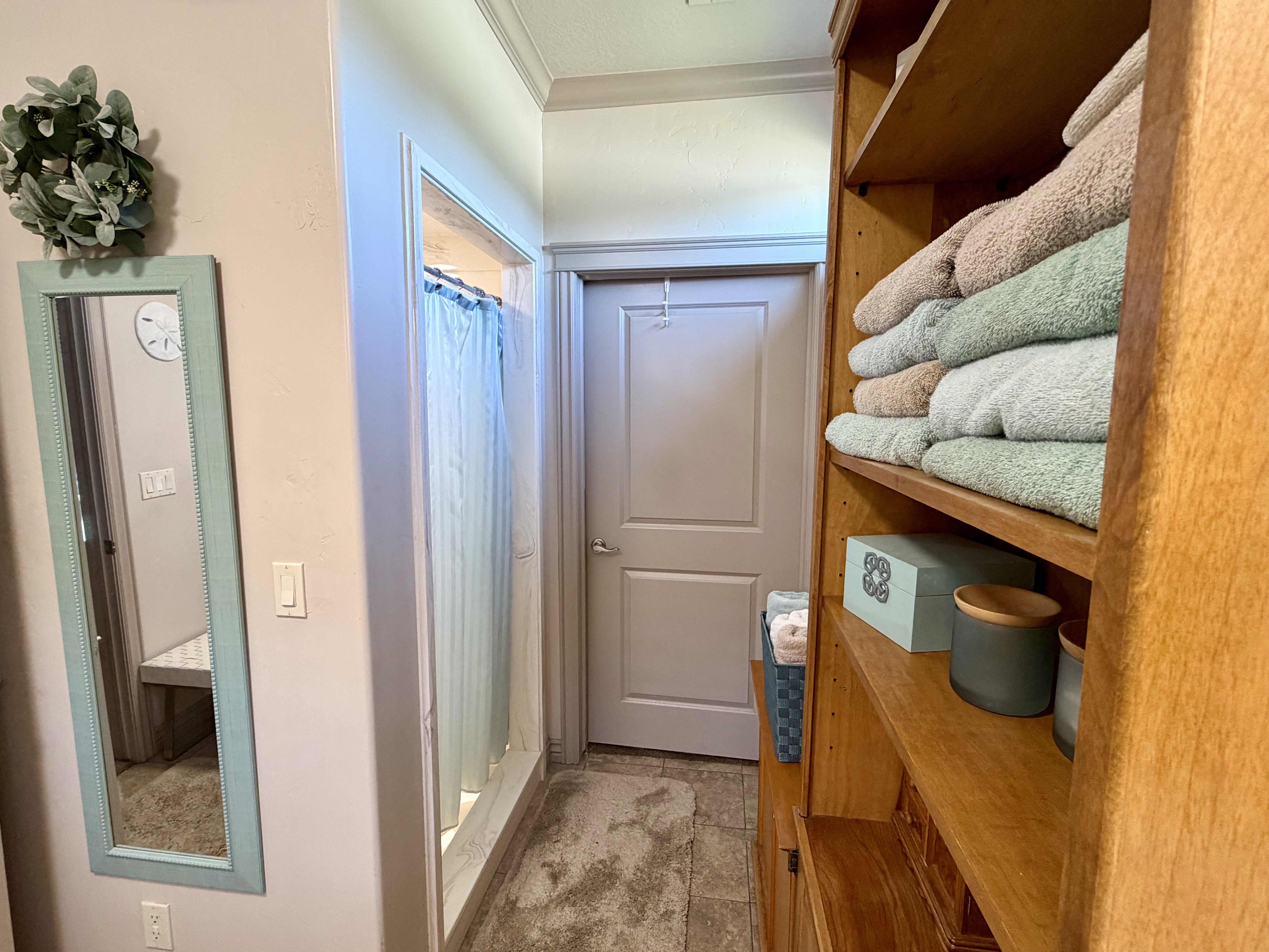 Shower and closet access in the master bathroom with more storage