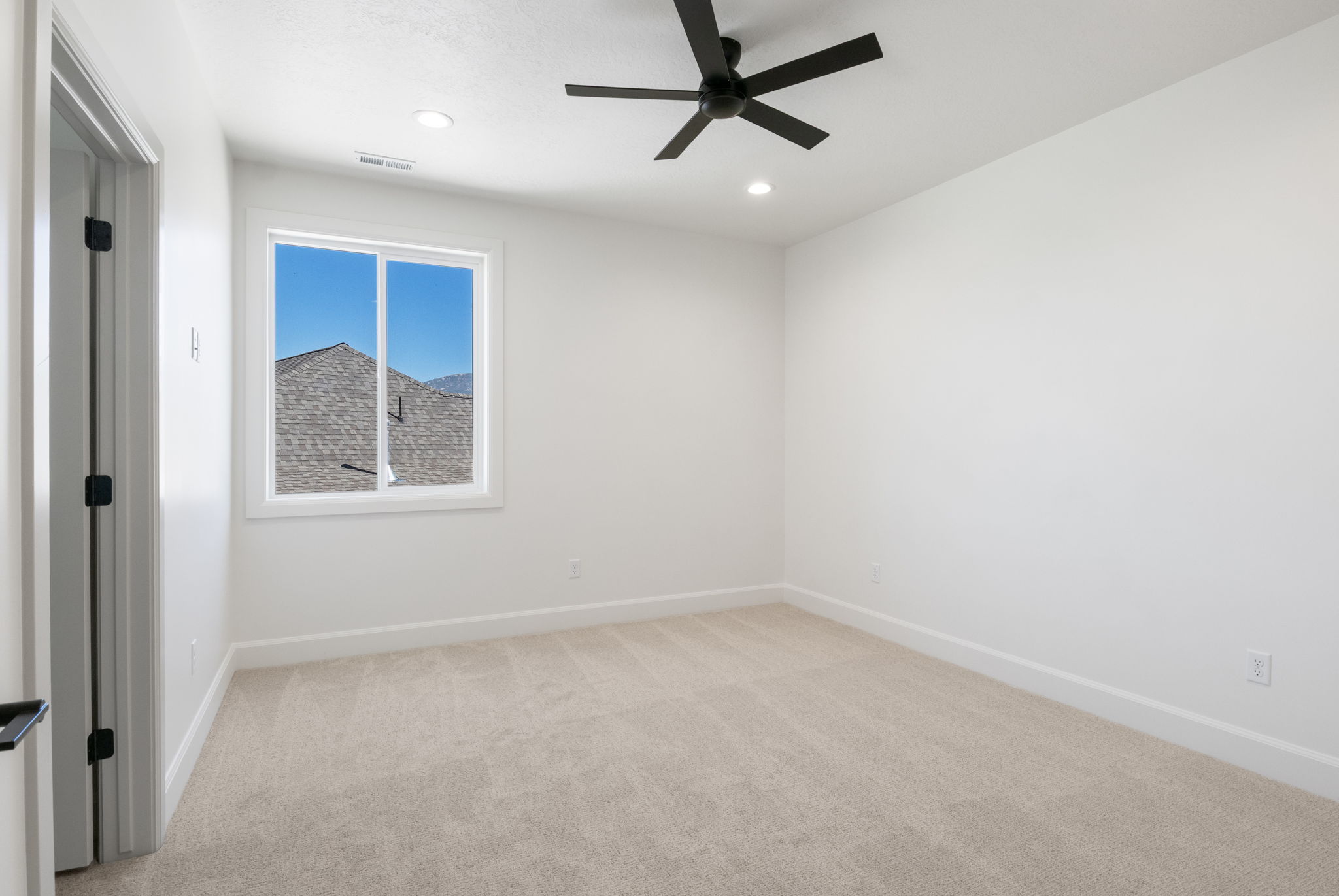 Neutral tone wall paint with white trim