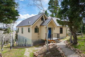 View of front of property featuring a metal roof
