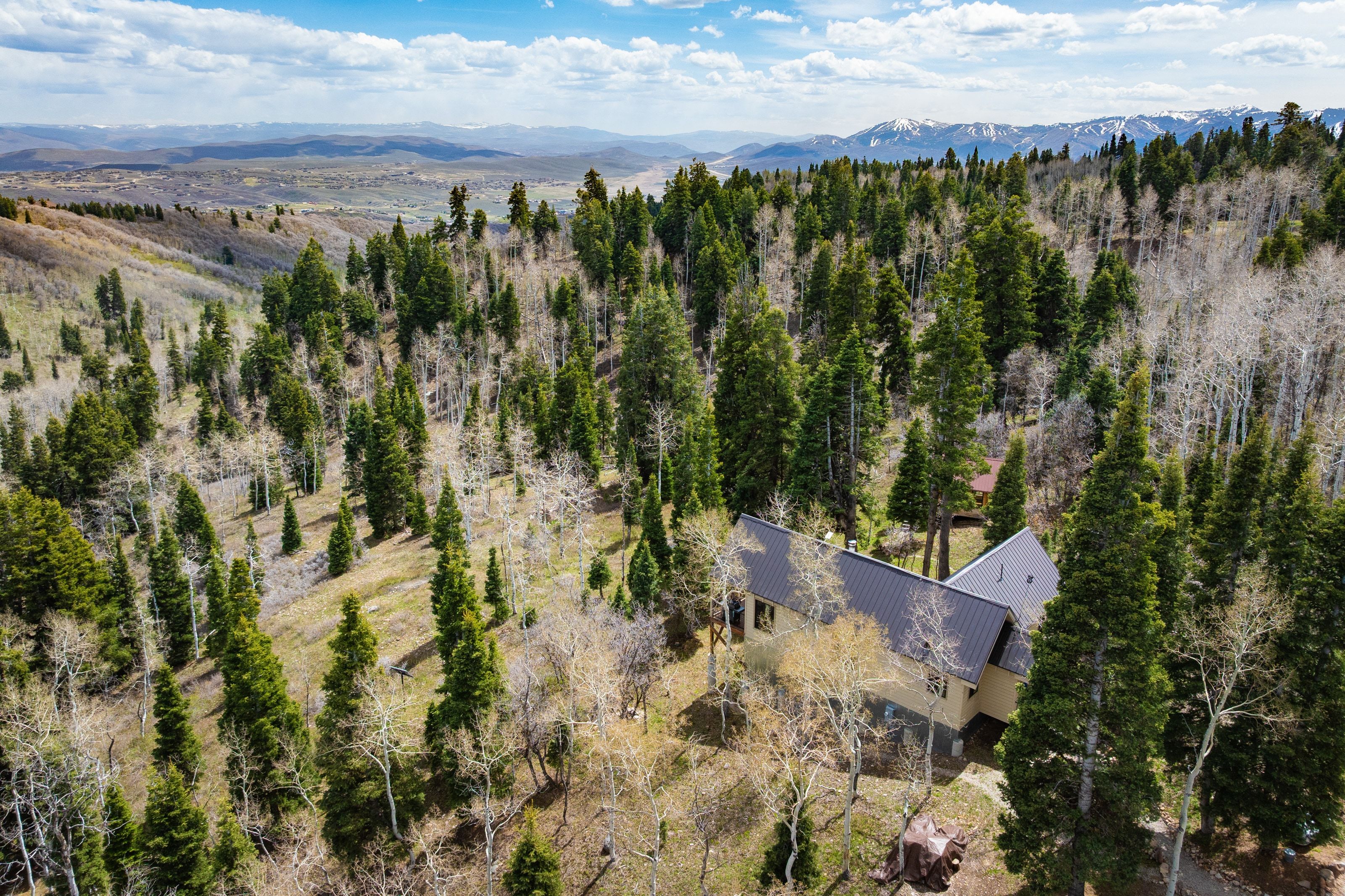 View of subject property featuring mountains