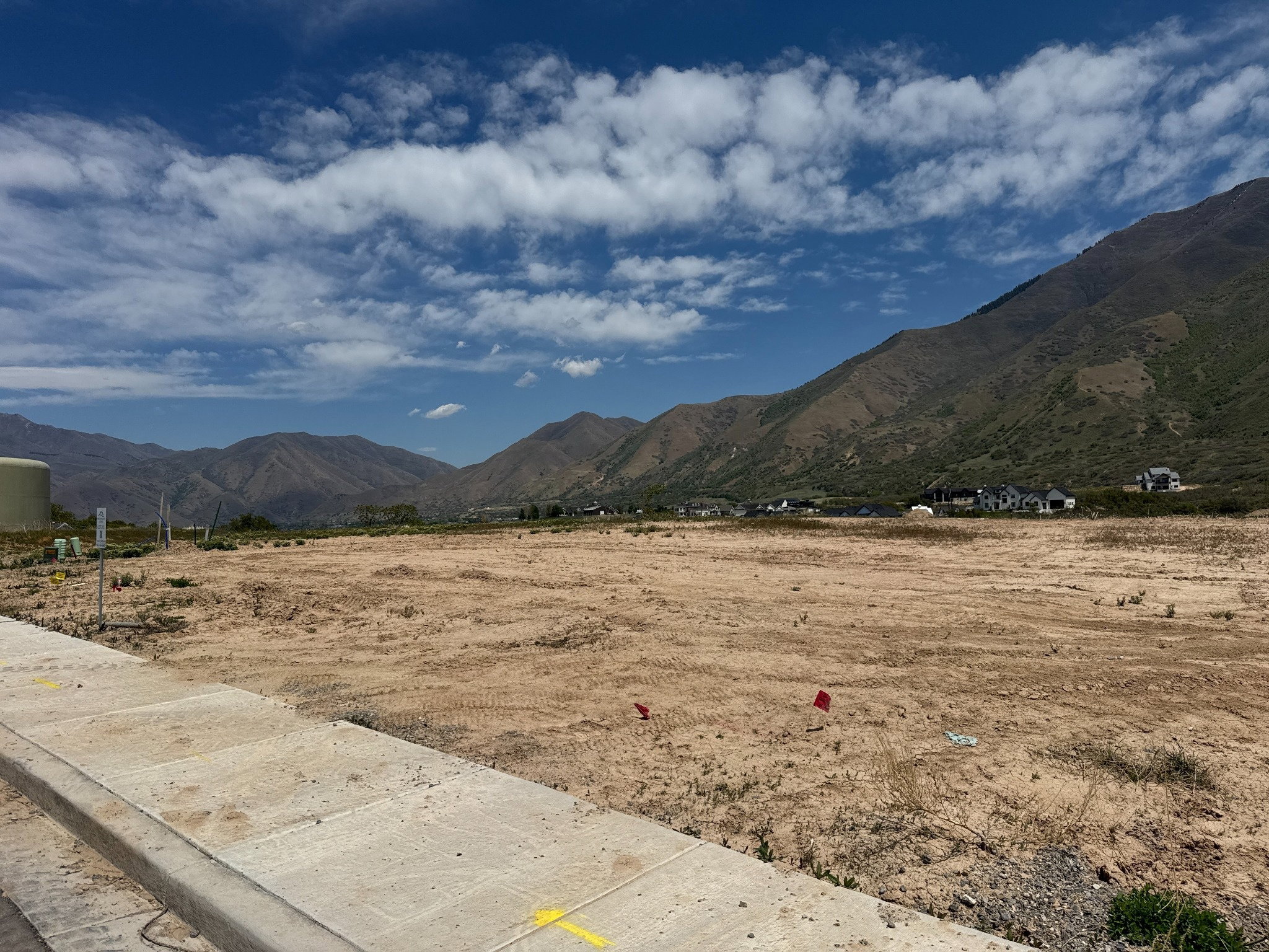 Expansive developed lot featuring mountain scenery and a clear sky
