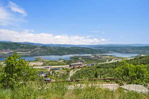 Expansive lake and mountain scenery from an elevated perspective