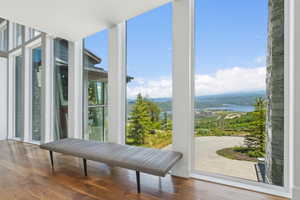 Full-height windows framing expansive outdoor scenery