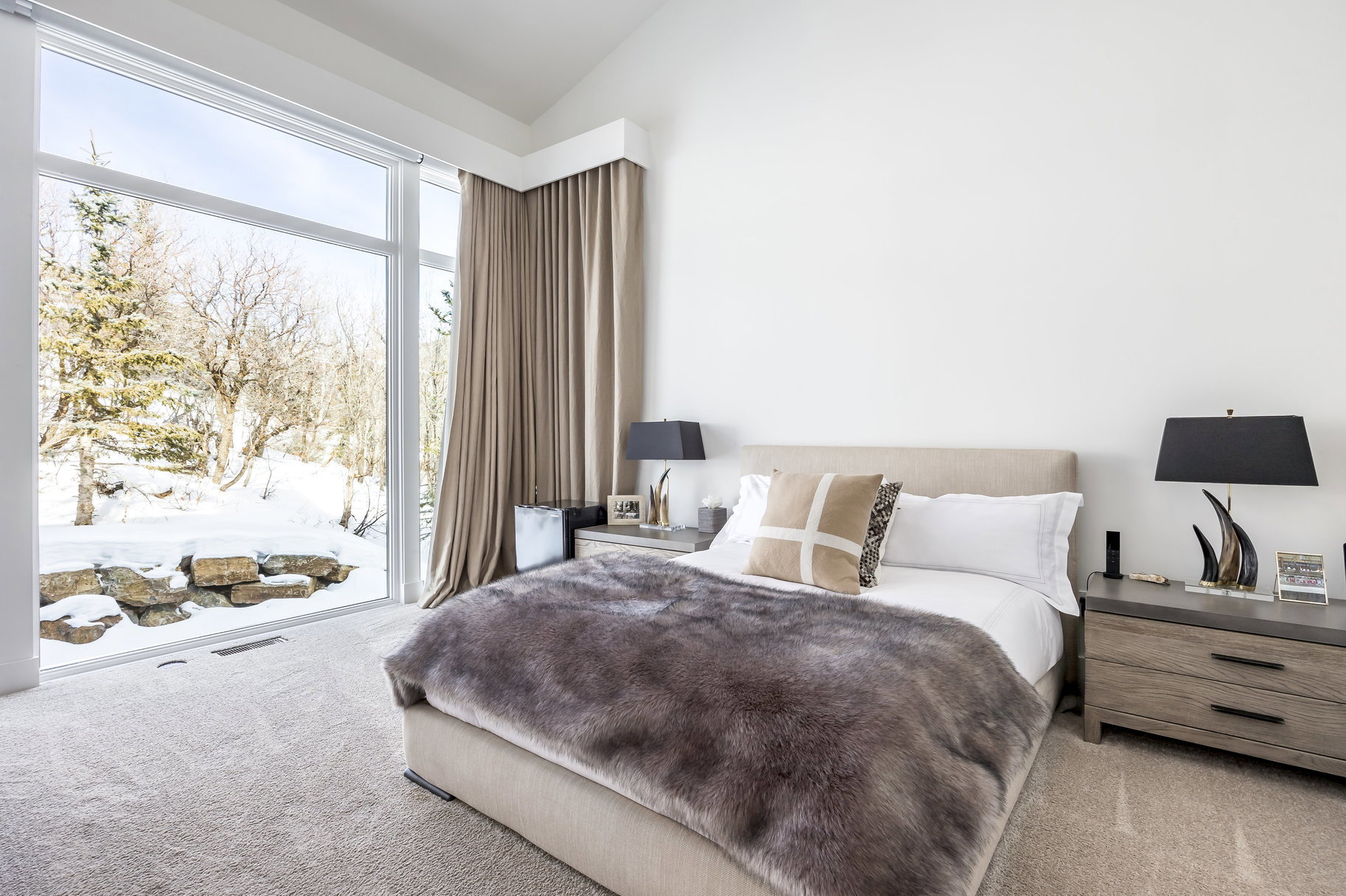 Floor-to-ceiling windows with outdoor scenery