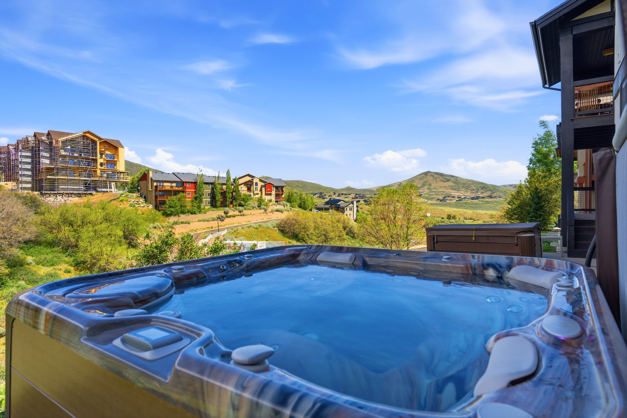 Outdoor spa featuring a multi-jet system, integrated controls, and a durable shell