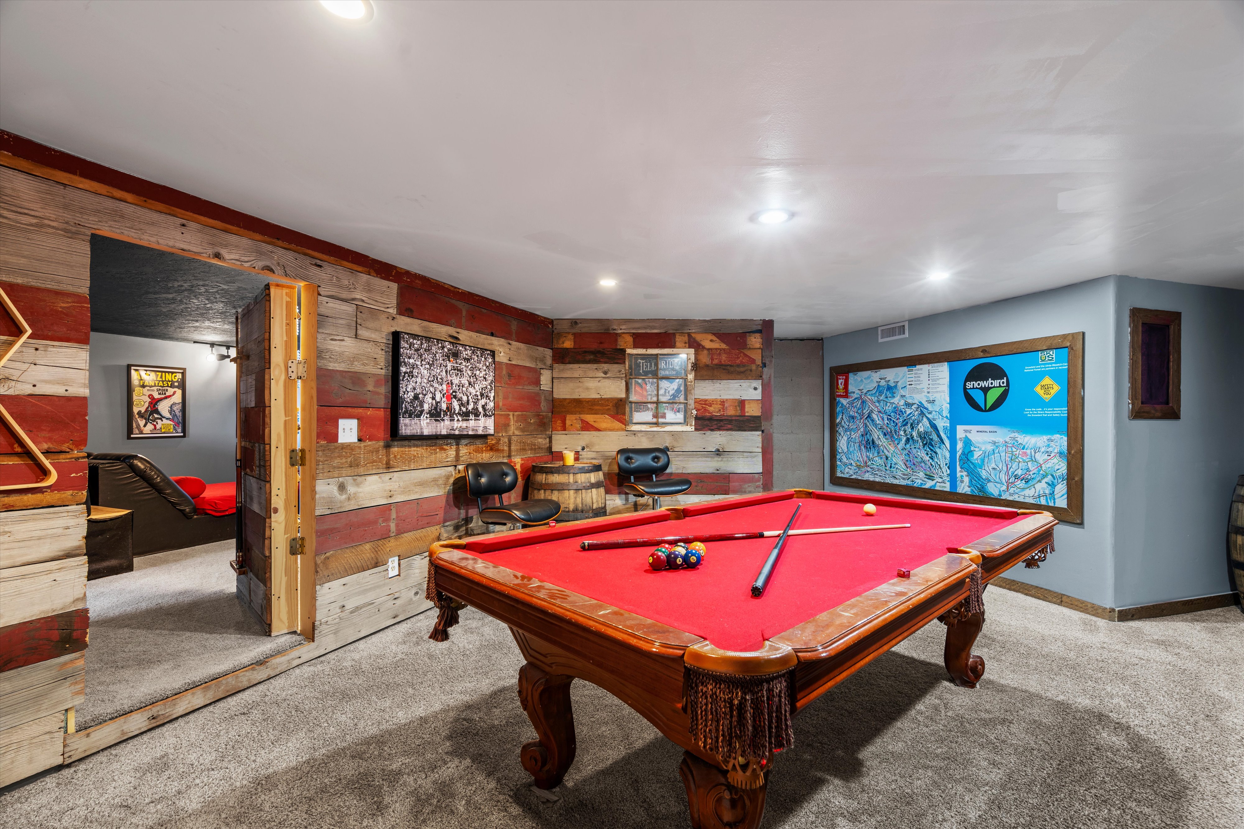 Entertainment space featuring a billiards table with a red felt surface, textured Barn wood-finish wall paneling, recessed lighting, and carpet flooring