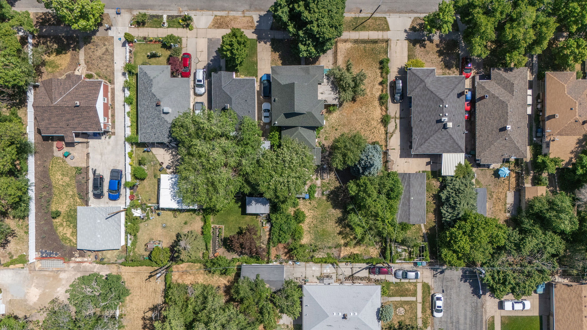 Aerial perspective showcasing residential properties with established landscaping