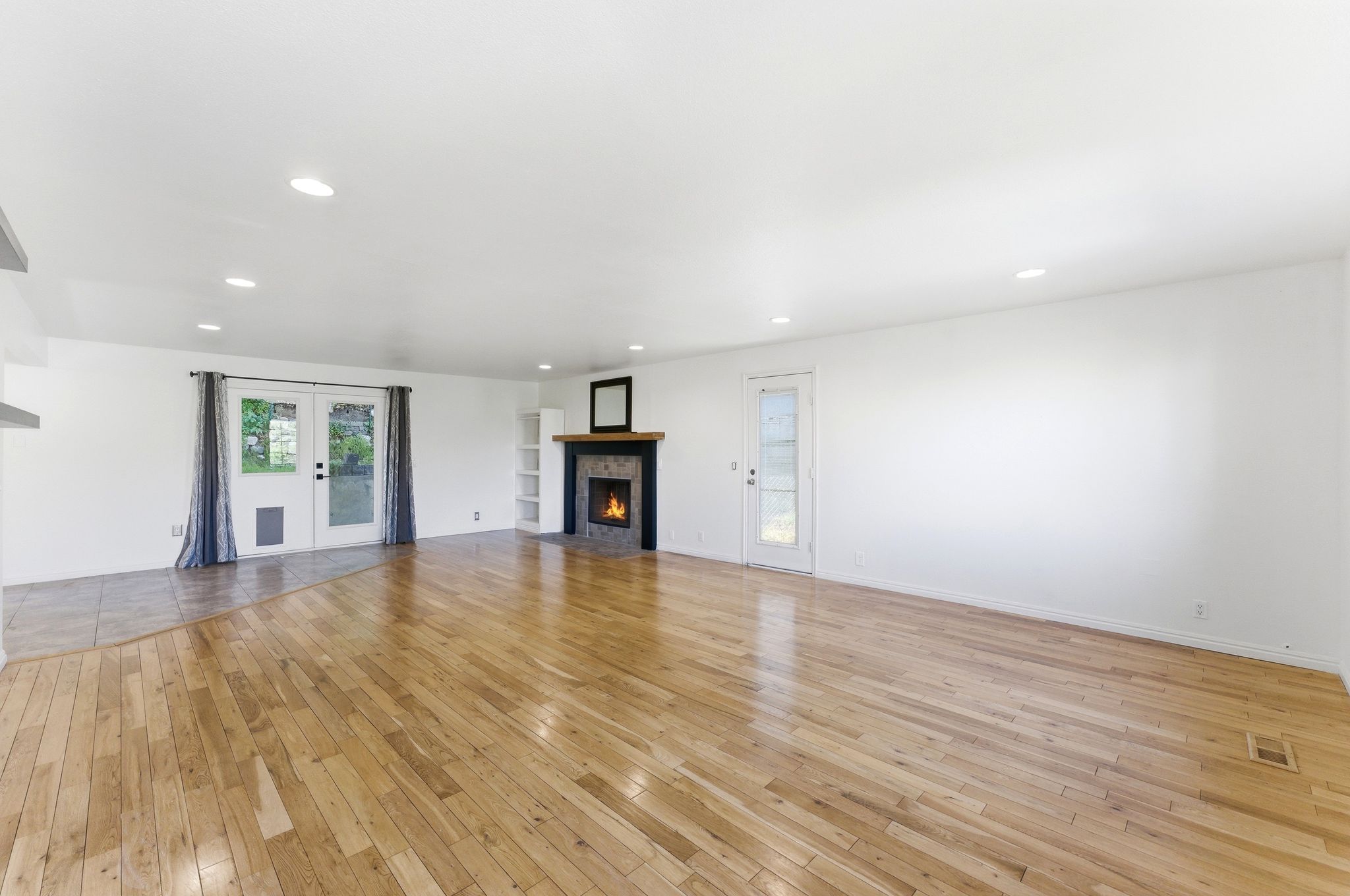 Family room right off kitchen with access to back patio