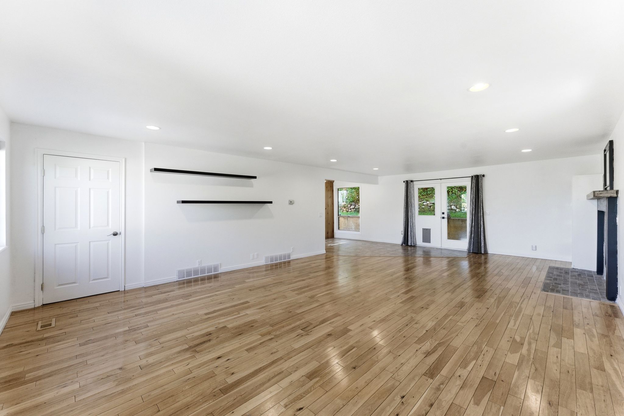 Spacious family room with walk-out to back patio.